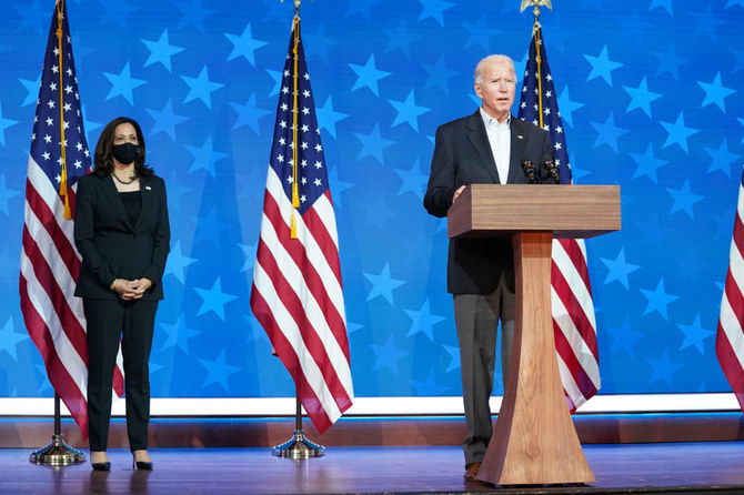 Democratic US presidential nominee Joe Biden is accompanied by vice presidential nominee Kamala Harris as he makes a statement on the 2020 US presidential election results during a brief appearance before reporters in Wilmington, Delaware, on Nov. 5, 2020. (REUTERS/Kevin Lamarque)