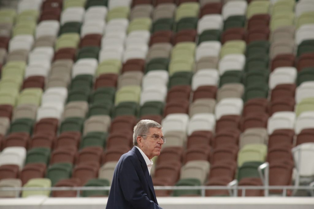 Thomas Bach president of IOC tours the Tokyo national Olympic stadium alone with his protective mask off. (ANJ photos) 