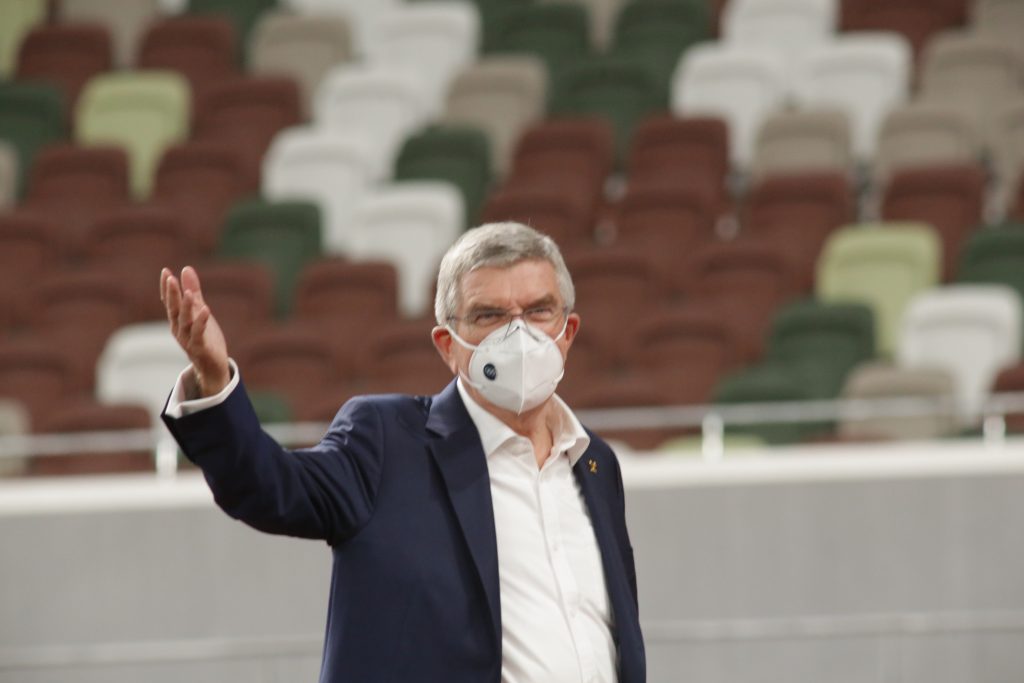 Thomas Bach chairman of IOC enters Tokyo Olympic National stadium with IOC and JOC delegation after he decided to hold Olympic Games . (ANJ photos)