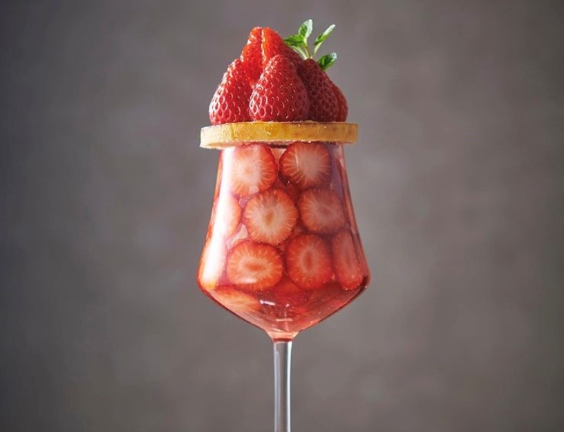 The dessert is made primarily using strawberries organized in a way that gives it a shape similar to the Olympic torch. (Yatsudoki/ Instagram)