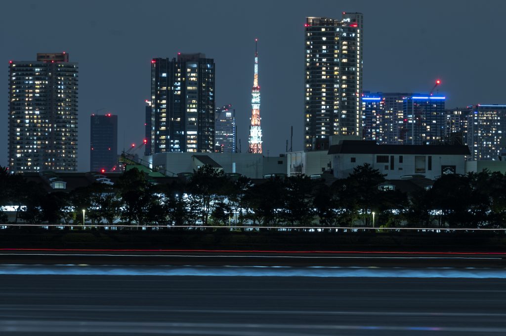 Japan aims to submit a report on its greenhouse has reduction efforts toward 2030 by next year's UN climate conference, Suga said. (AFP)