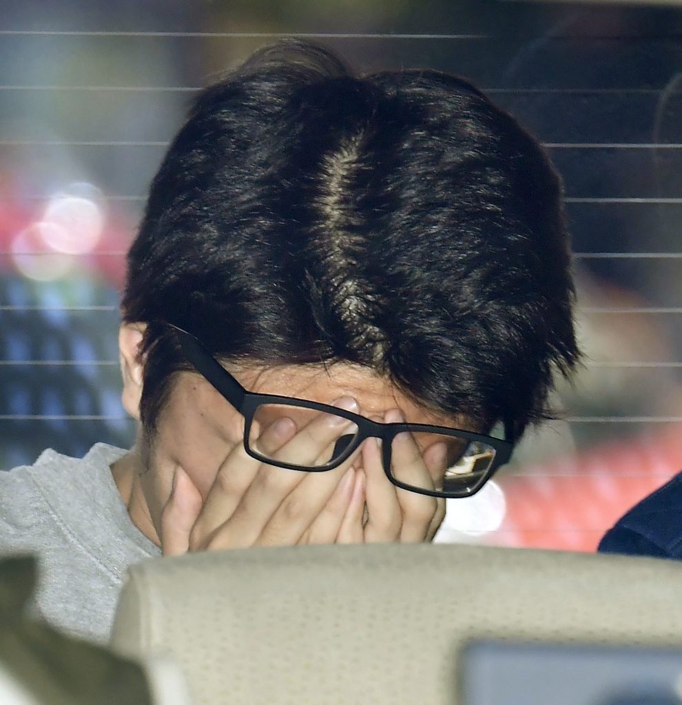 Takahiro Shiraishi arrives at a branch of Tokyo district public prosecutor's office in Tachikawa, suburbs of Tokyo in November, 2017. A Japanese court on Tuesday, Dec. 15, 2020 sentenced a man to death for killing and dismembering nine people who had posted suicidal thoughts on social media, in a case that shocked the country. (Masanobu Kumagai/Kyodo News via AP)