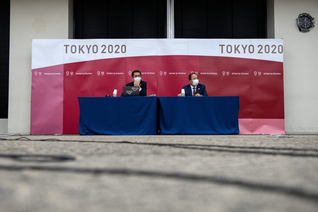 Tokyo 2020 Olympic Games CEO Toshiro Muto (R) speaks during a news conference following a Tokyo 2020 Olympics Executive Board meeting in Tokyo, Japan December 22, 2020. (File photo/ Reuters)