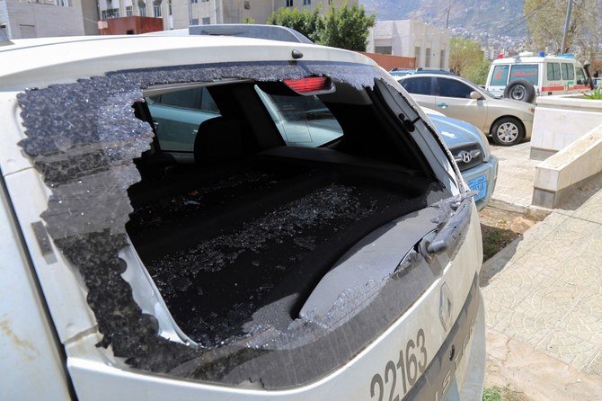 A picture taken on April 21, 2018, shows the shattered rear window of the Red Cross in Taiz. (File/AFP)