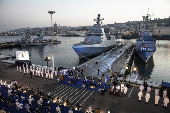 Israeli President Rivlin and IDF Chief of Staff Aviv Kohavi attend a ceremony celebrating the arrival of the first of four new Sa'ar 6 ships, left, in Haifa, Israel on Wednesday, Dec. 2, 2020. (AP)