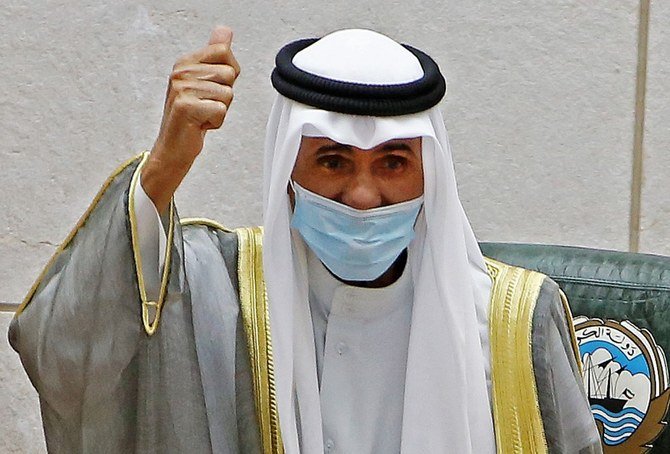 Emir of Kuwait Sheikh Nawaf Al-Ahmad Al-Jaber al-Sabah gestures in greeting upon arrival to attend the opening of the 5th regular session at the country's National Assembly (parliament) in Kuwait City on October 20, 2020. (File/AFP)