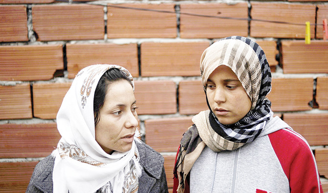 A Jan. 20, 2011 file photo shows Leila Bouazizi, left, and her sister, Basma. (AFP)