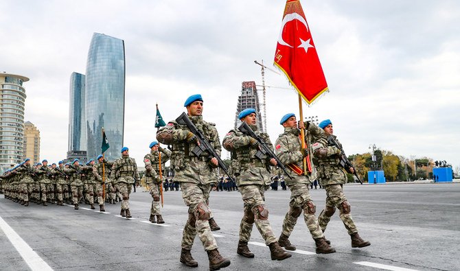 Members of a Turkish forces commando brigade take part in a military parade in which Turkey's President Recep Tayyip Erdogan and Azerbaijan's President Ilham Aliyev, looked on in Baku, Azerbaijan, Thursday, Dec. 10, 2020. (AP)
