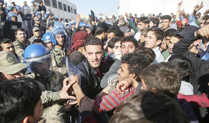 Syrian protesters clash with Turkish forces during a demonstration in the town of Al-Bab against the Turkish presence. (File/AFP)