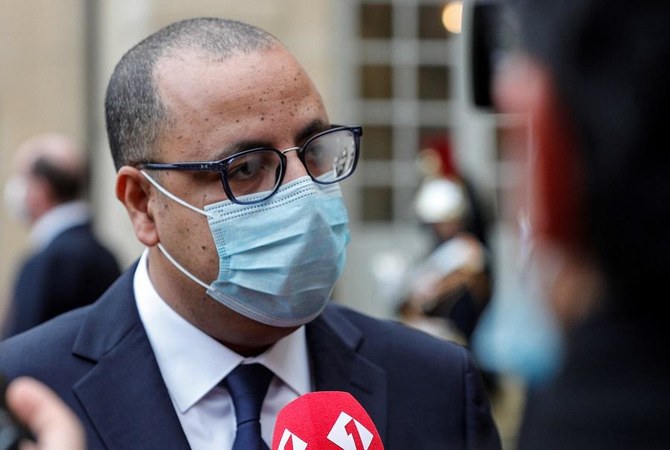 Tunisian Prime Minister Hichem Mechichi speaks to the press after a meeting with his French counterpart at the Hotel Matignon in Paris on December 14, 2020. (File/AFP)