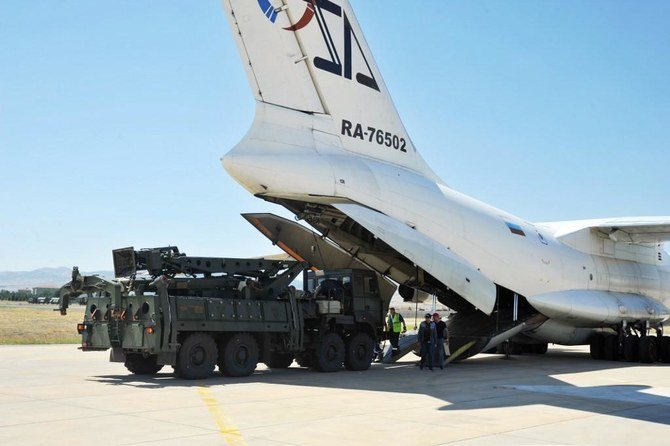 Above, a Russian military cargo plane unloads S-400 missile defense systems at the Murted military airbase, northwest of Ankara on Aug. 27, 2019. (Turkish Defense Ministry/AFP)