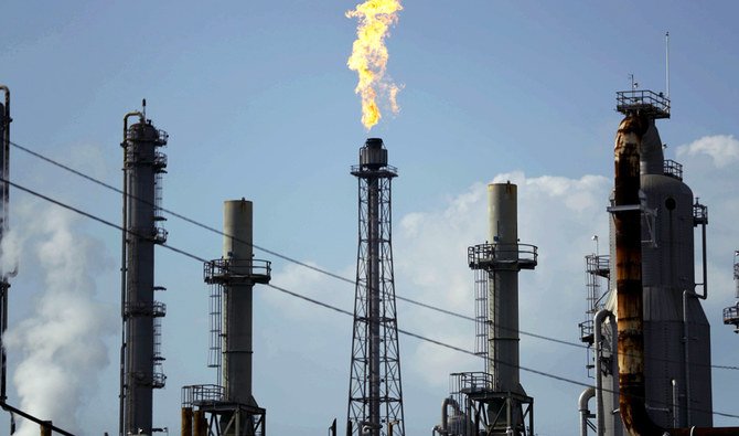 A flame burns at the Shell Deer Park oil refinery in Deer Park, Texas. Oil dipped toward $51 a barrel on Friday. (AP/File)