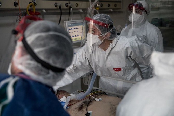 Medical staff watch a COVID-19 patients vital signs at the Marmara University Pendik Education and Research Hospital, Intensive Care Unit (ICU) on May 8, 2020 in Istanbul, Turkey. (File/AFP)