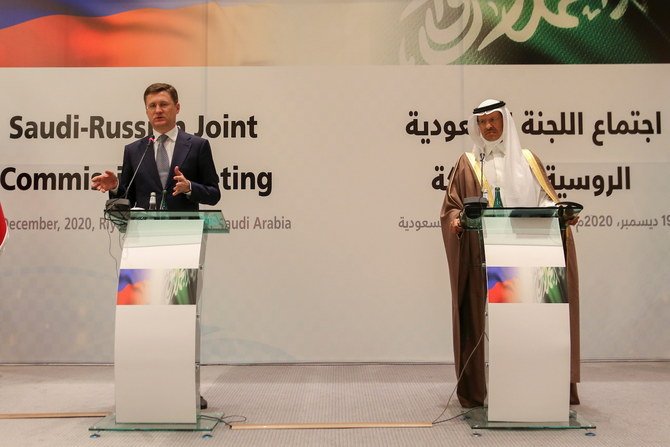 Saudi Energy Minister Prince Abdul Aziz bin Salman attends a press conference with Russia's Alexander Novak at the Ritz-Carlton Hotel in Riyadh on December 19, 2020. (Reuters)