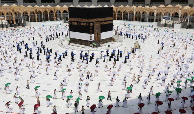 A picture taken on July 29, 2020 shows pilgrims circumambulating around the Kaaba, Islam's holiest shrine, at the centre of the Grand Mosque in the holy city of Makkah. (AFP)