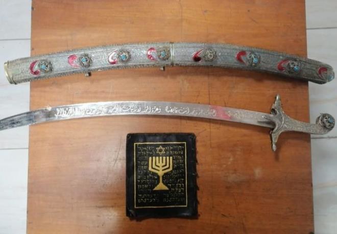 The ancient book is made from leather and contains 17 pages written in Hebrew using gold. (File/AFP)