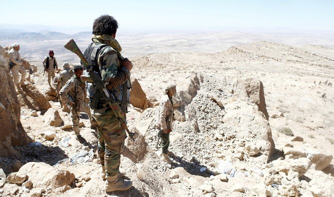 Yemeni soldiers stand on their position on a mountain on the frontline of fighting with Houthis in Nihem area, near Sanaa, Yemen, in this file photo taken on January 27, 2018. (REUTERS)