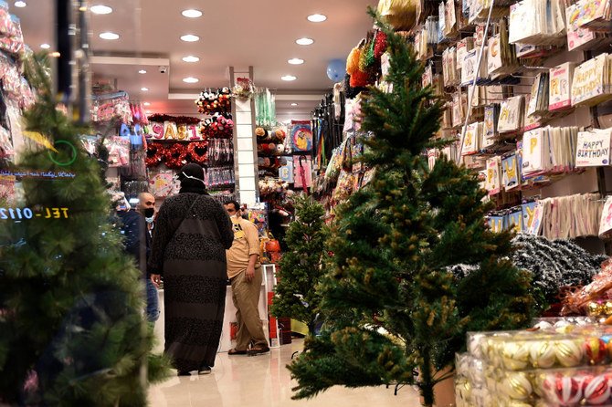Expats living in Saudi Arabia choose Christmas decorations at a gift shop in the capital Riyadh. (AFP)