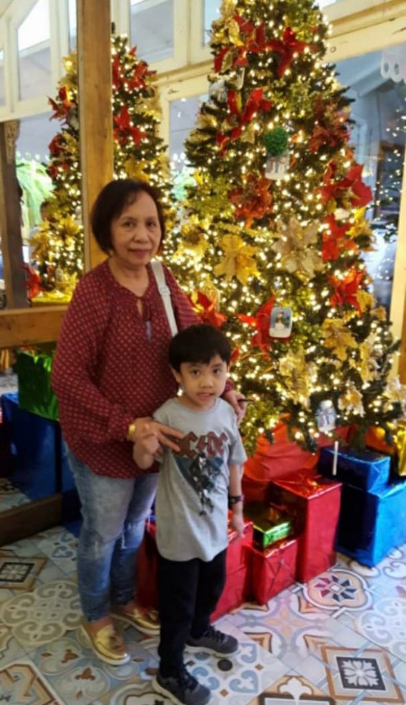 Fina Concepcion and her son at a shopping mall in the Philippines during Christmas last year. (Supplied)