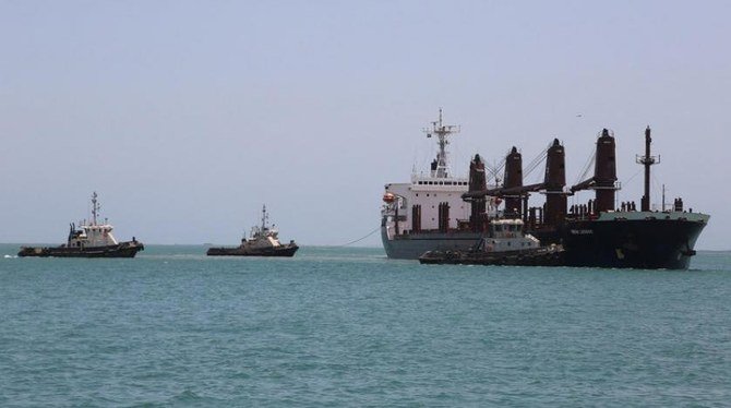 Tugboats are seen near a ship in the Red Sea port of Hodeidah, Yemen. (Reuters)