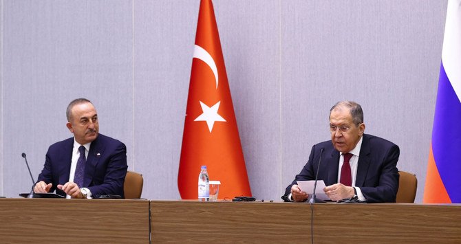 Mevlut Cavusoglu was joined by his Russian counterpart, Sergei Lavrov, in vowing to press ahead with strengthening links between the two countries. (AFP/Russian Foreign Ministry)
