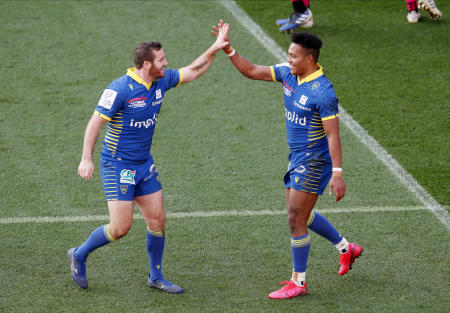 Clermont Auvuergne's Kotaro Matsushima (right) celebrates after he scores a try with teammates. (Reuters)