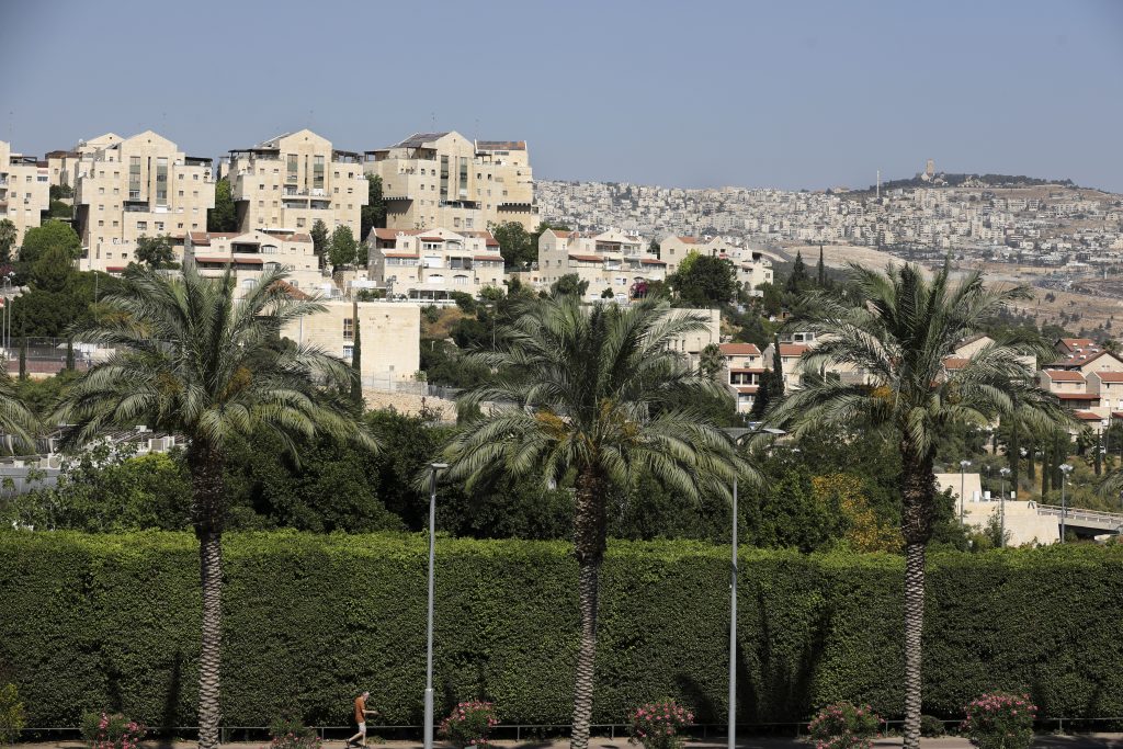 A picture taken on on July 1, 2020, shows a general view of the Israeli settlement of Maale Adumim, Israel's largest in the occupied West Bank, with a view the Jerusalem skyline in the background. (AFP)