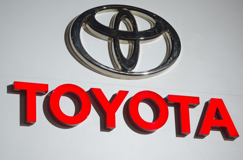Toyota will pay $180 million to settle charges it failed to comply with rules mandating that auto companies report problems with vehicle emissions to authorities, the US Department of Justice said on Jan 14, 2021. (AFP)