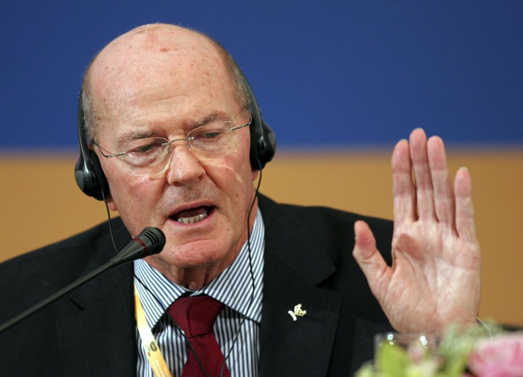 In this April 10, 2008, file photo, Senior International Olympic Committee member Kevan Gosper speaks at a news conference in Beijing. Gosper, a former International Olympic Committee vice president, is suggesting the United Nations might be the place to decide the fate of the postponed Tokyo Olympic. They are to open on July 23, 2021, but face mounting opposition at home as COVID-19 cases surge in Tokyo, across Japan and across the globe. (AP Photo/Greg Baker, File)