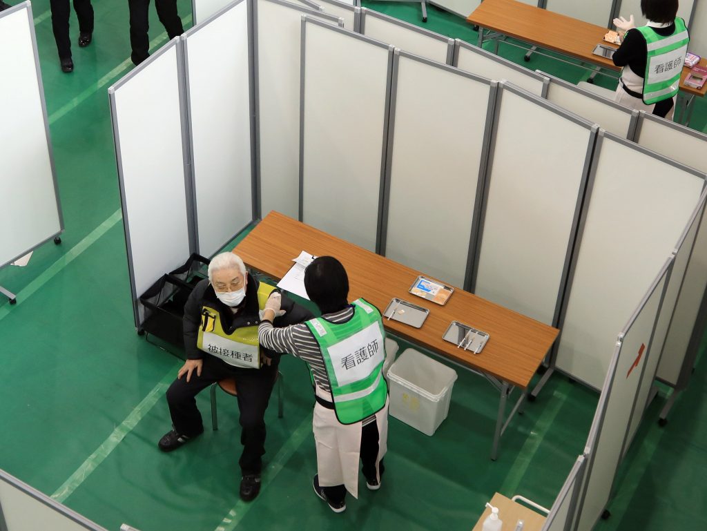 People participate in a coronavirus vaccination simulation in Kawasaki, south of Tokyo, Japan, Jan. 27, 2021. (File photo/Reuters)