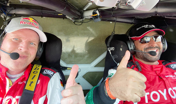 Racer Yazeed Al-Rajhi, right, with co-pilot Dirk Von Zitzewitz. (Dakar Rally)