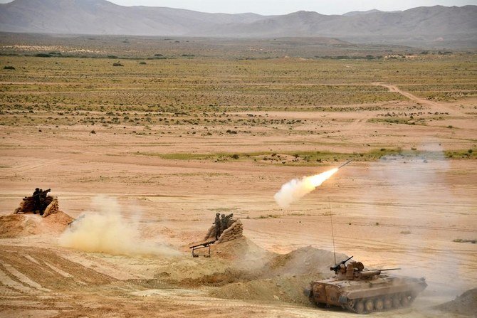 Picture made available by the Algerian Ministry of Defence on April 30, 2019, shows soldiers taking part in manoeuvres at an undisclosed location in Algeria. (File/AFP)
