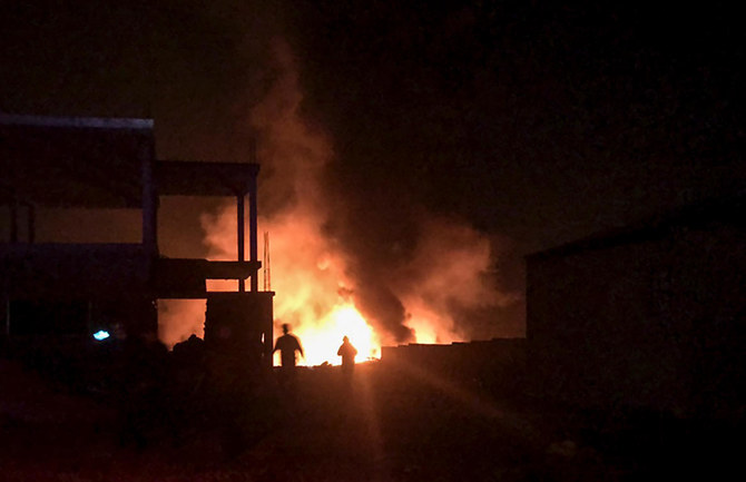 Fire and smoke plumes rise at the scene of an explosion in the Lebanese Hermel governorate in the eastern Bekaa valley, near the Syrian border, on January 3, 2021. (AFP)