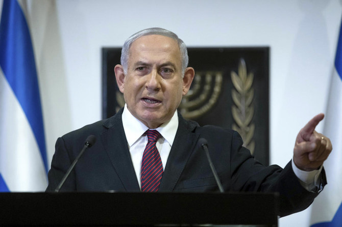 In this Dec. 22, 2020 file photo, Israeli Prime Minister Benjamin Netanyahu delivers a statement at the Israeli Knesset, or Parliament, in Jerusalem. (Yonatan Sindel/AP)