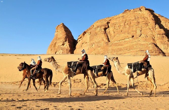 Camel rides across sandstone ancient sandstone architecture are among the attractions offered in AlUla to visitors. (SPA)