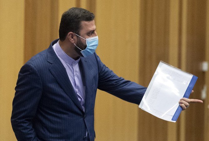 Kazem Gharibabadi, Iran’s Ambassador to the International Atomic Energy Agency (IAEA), wears a face mask as he arrives for the Board of Governors of the IAEA at the agency’s headquarters in Vienna, Austria on Sept. 14, 2020. (File/AFP)