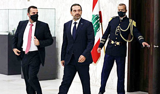 Lebanese leader Saad Hariri walks after being named Lebanon’s new prime minister at the presidential palace in Baabda, Lebanon. (Reuters/File)