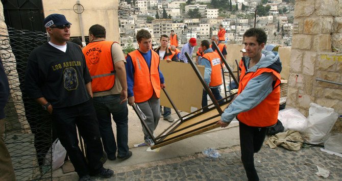 The plans are illegal under international law but are able to pass through the “narrow” Israeli courts. (AFP/File)