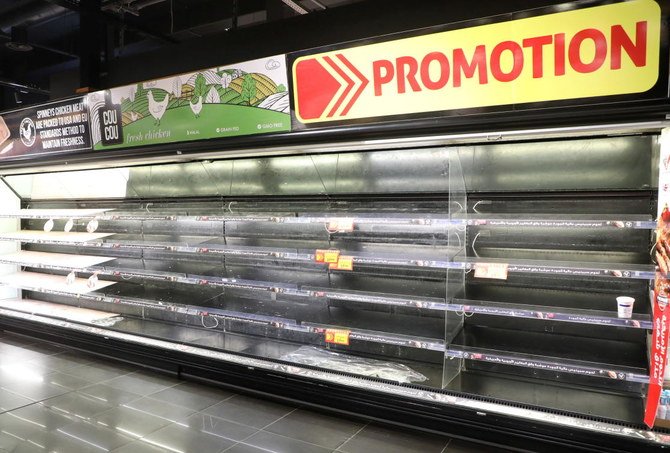 Empty shelves are pictured inside a supermarket after people hoarded food as authorities are discussing the latest measures to implement to curb the spread of the coronavirus disease (COVID-19), in Beirut, Lebanon, January 11, 2021. (Reuters)