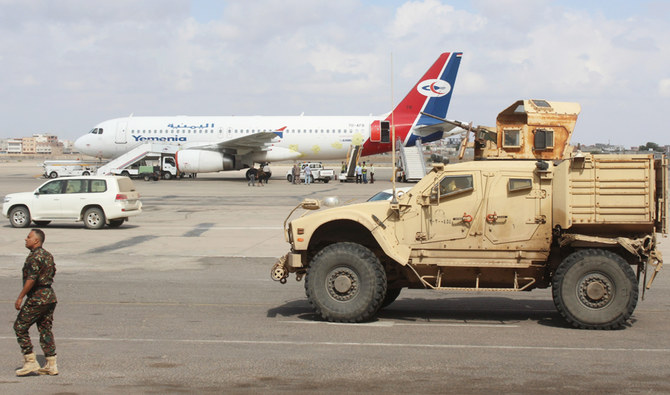 A military vehicle is stationed on the tarmac of Yemen’s Aden airport. Yemen says the Stockholm Agreement has failed to bring peace to the country. (File/AFP)