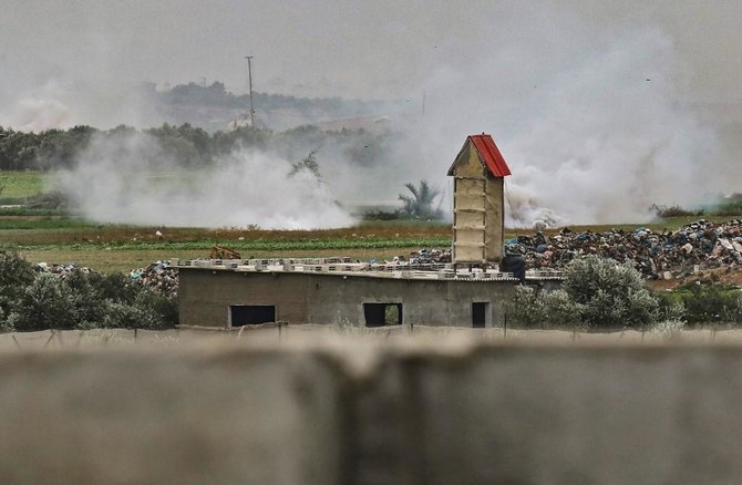 Smoke rises at the scene of an Israeli attack on a Hamas position earlier on Jan. 13, 2021 near the Palestinian city of Khan Yunis in the southern Gaza Strip. (AFP)