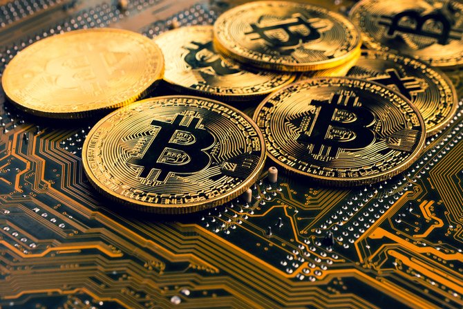 Cryptocurrency mining is a process in which specialized computers complete progressively more difficult calculations to verify transactions and thereby produce cryptocurrencies, the most popular of which is Bitcoin. (Shutterstock/File Photo)
