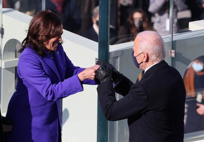 Vice President Kamala Harris celebrates with President-elect Joe Biden after being sworn in during the inauguration of US President-elect Joe Biden on the West Front of the US Capitol. (AFP)