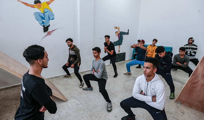 Palestinian boys train at the Wallrunners Parkour Academy in Gaza City. (AFP)