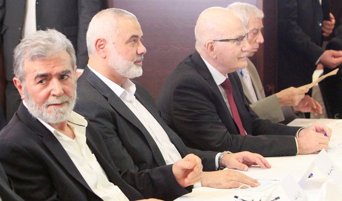 Hamas Chief Ismail Haniyeh and Islamic Jihad Chief Ziyad al-Nakhalah attend the Palestinian factions' meeting over Israel and the United Arab Emirates' deal to normalise ties, in Beirut, Lebanon September 3, 2020. (REUTERS)