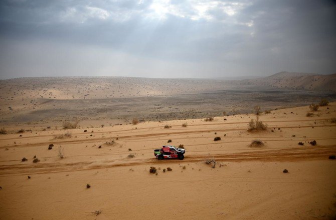 Toyota's driver Yazeed Al Rajhi of Saudi Arabia and co-driver Dirk Von Zitzewitz of Germany compete during the 6th Stage of the Dakar Rally 2021. (AFP)