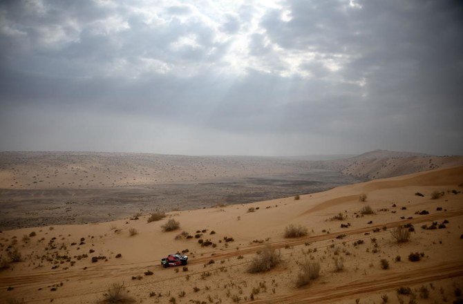 Toyota's driver Yazeed Al-Rajhi of Saudi Arabia and co-driver Dirk Von Zitzewitz of Germany compete during stage 7 of the Dakar Rally 2021. (AFP)