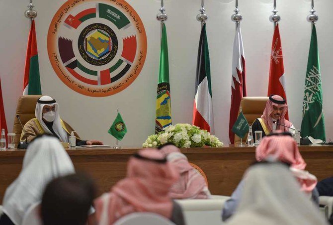 Saudi Foreign Minister Prince Faisal bin Farhan (right) and Secretary General of the Gulf Cooperation Council Nayef Al-Hajraf hold a press conference at the end of the GCC’s 41st summit, in the city of AlUla in northwestern Saudi Arabia on Jan. 5, 2021. (AFP)
