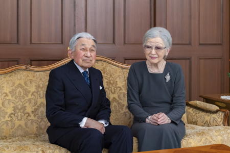 In this photo provided by the Imperial Household Agency of Japan, Japan's Emperor Emeritus Akihito (left) and Empress Emerita Michiko pose for a photograph during a family photo session for the New Year at their residence in Tokyo, on Dec. 2, 2020. (The Imperial Household Agency of Japan via AP)