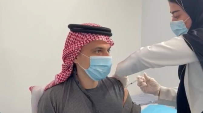 Prince Faisal shared a picture on Twitter of himself receiving the shot. (@FaisalbinFarhan)